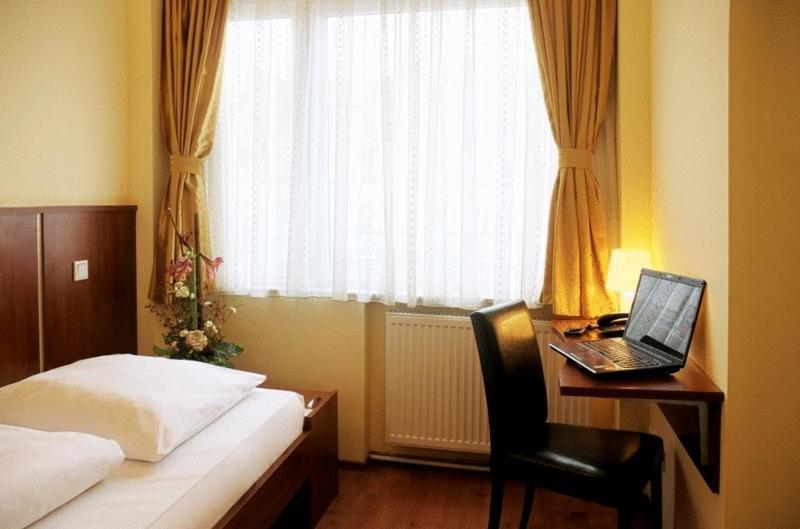 Atlas City Hotel München Phòng bức ảnh